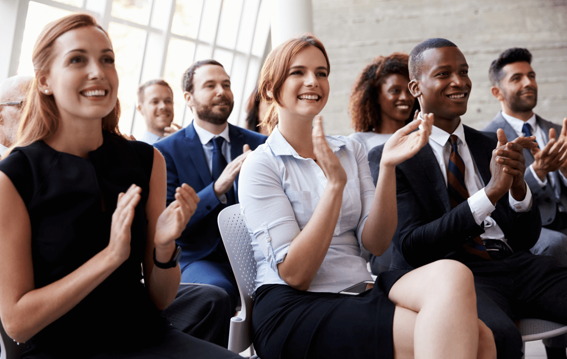 Event attendees clapping