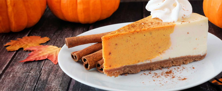 Pumpkin cheesecake with cinnamon sticks